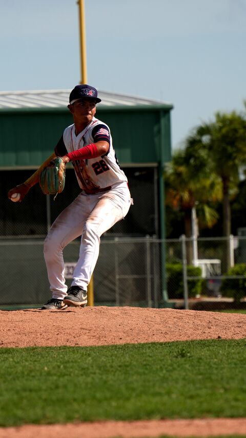 Player fielding the ball on the field