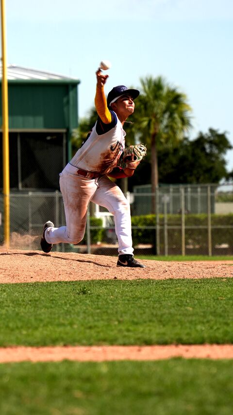 Pitcher finishing his pitch